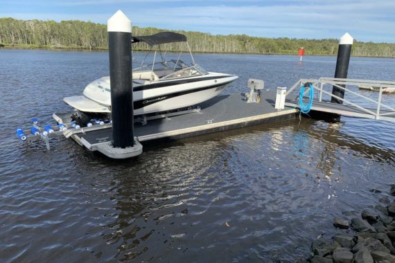 How do you keep a floating dock in place?